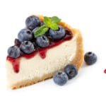 Set,Of,Cheesecakes,With,Fresh,Berries,And,Mint,Isolated,On
