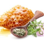 Honeycomb,With,Thyme,Tea,In,White,Background