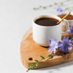 Chicory,Drink,In,A,White,Mug,With,Chicory,Flowers,Next