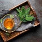 Sage,Tea,In,A,Cup,Served,On,A,Trey,Close