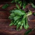 Sorrel.,Bunch,Of,Fresh,Green,Organic,Sorrel,Leaf,On,Wooden