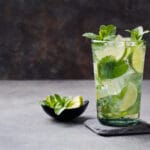 Mojito,Cocktail,With,Lime,And,Mint,In,Highball,Glass,On